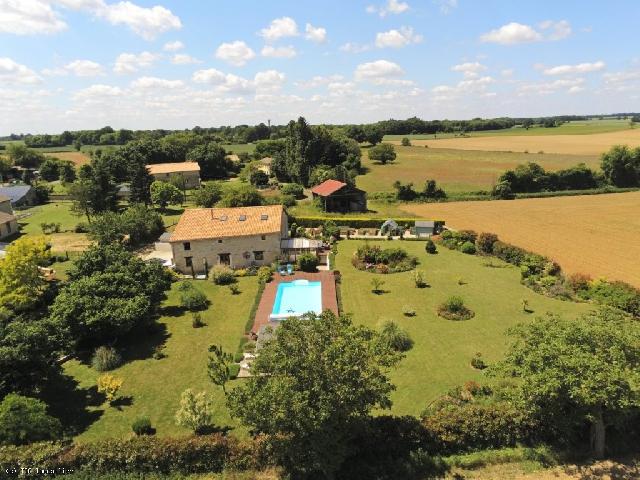 House for sale CIVRAY 86400 Vienne Poitou-Charentes France: Elegant Country Home with Pool, Panoramic Views and Refined Living Spaces. This beautifully designed barn conversion which has been renovated over the last eight years offers four bedrooms (or a fifth...