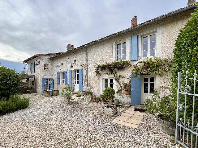 House&nbsp;for sale&nbsp;SAINT-SÉVERIN 16390 Charente Poitou-Charentes France: Beautiful village house with guest accommodation and barns. A beautifully renovated 4/5 bedroom village house situated in a quiet hamlet surrounded by countryside and within walking distance of a loca...