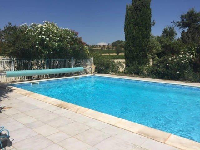 Huis te koop in&nbsp;PUICHERIC 11700 Aude Languedoc Roussillon Frankrijk: Ruim huis met 5 slaapkamers in de Aude met zwembad en tuin - vlakbij het Canal du Midi. Deze karaktervolle woning met 5 slaapkamers, verdeeld over twee verdiepingen, is gebouwd in 1910 en volledig ger...